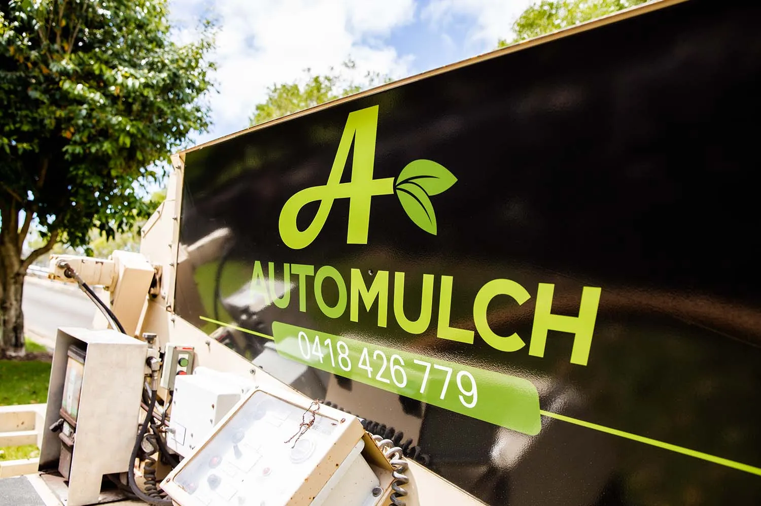 AutoMulch blower truck with the 0418 426 779 phone number